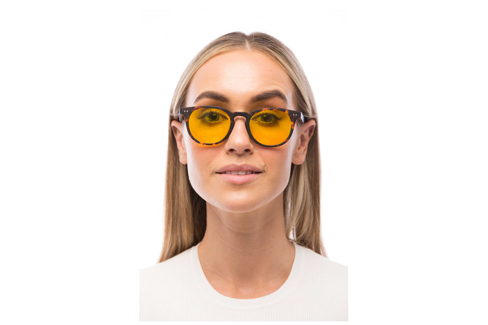 Woman Wearing Clarke Light Sensitivity Glasses Prescription