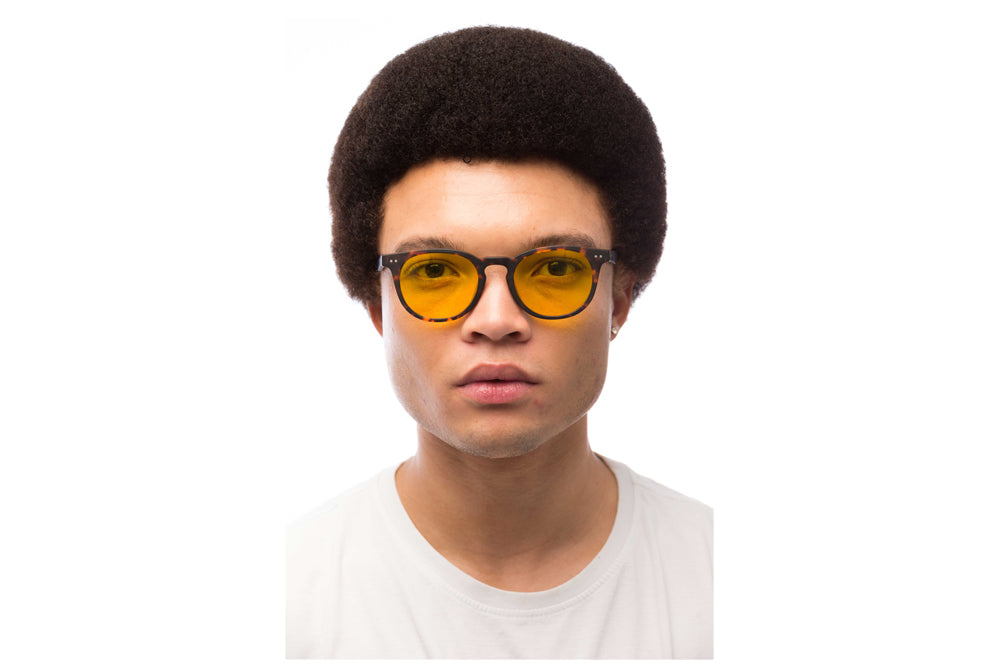 Man Wearing Clarke Light Sensitivity Glasses Prescription