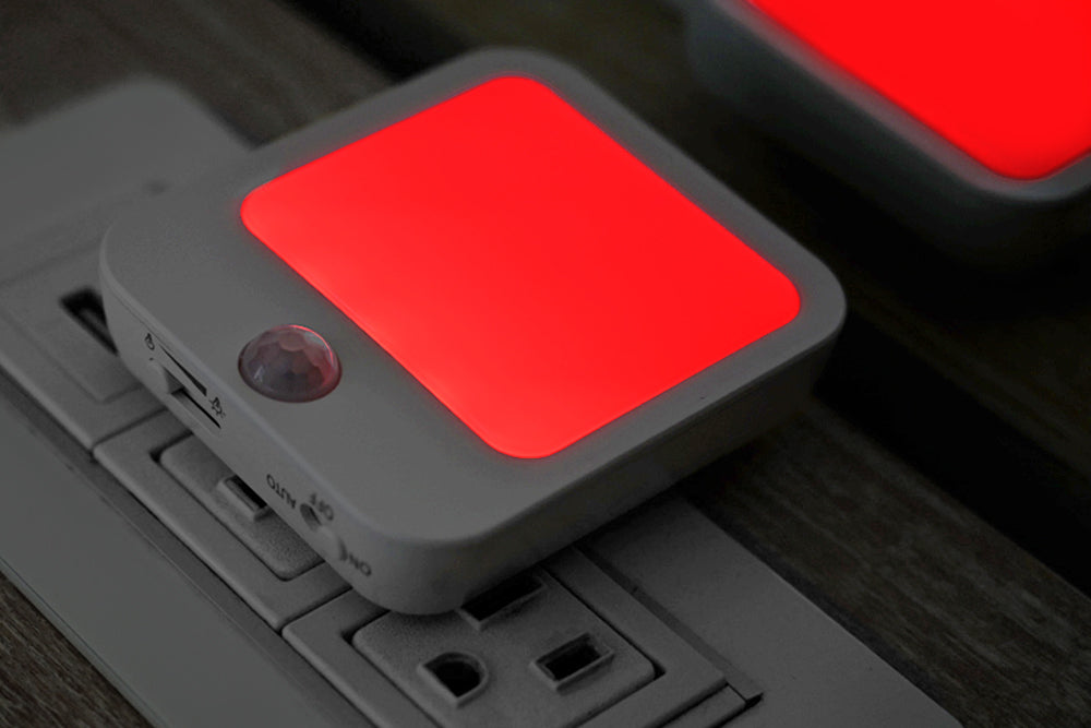 Plug In Night Light Glowing Red