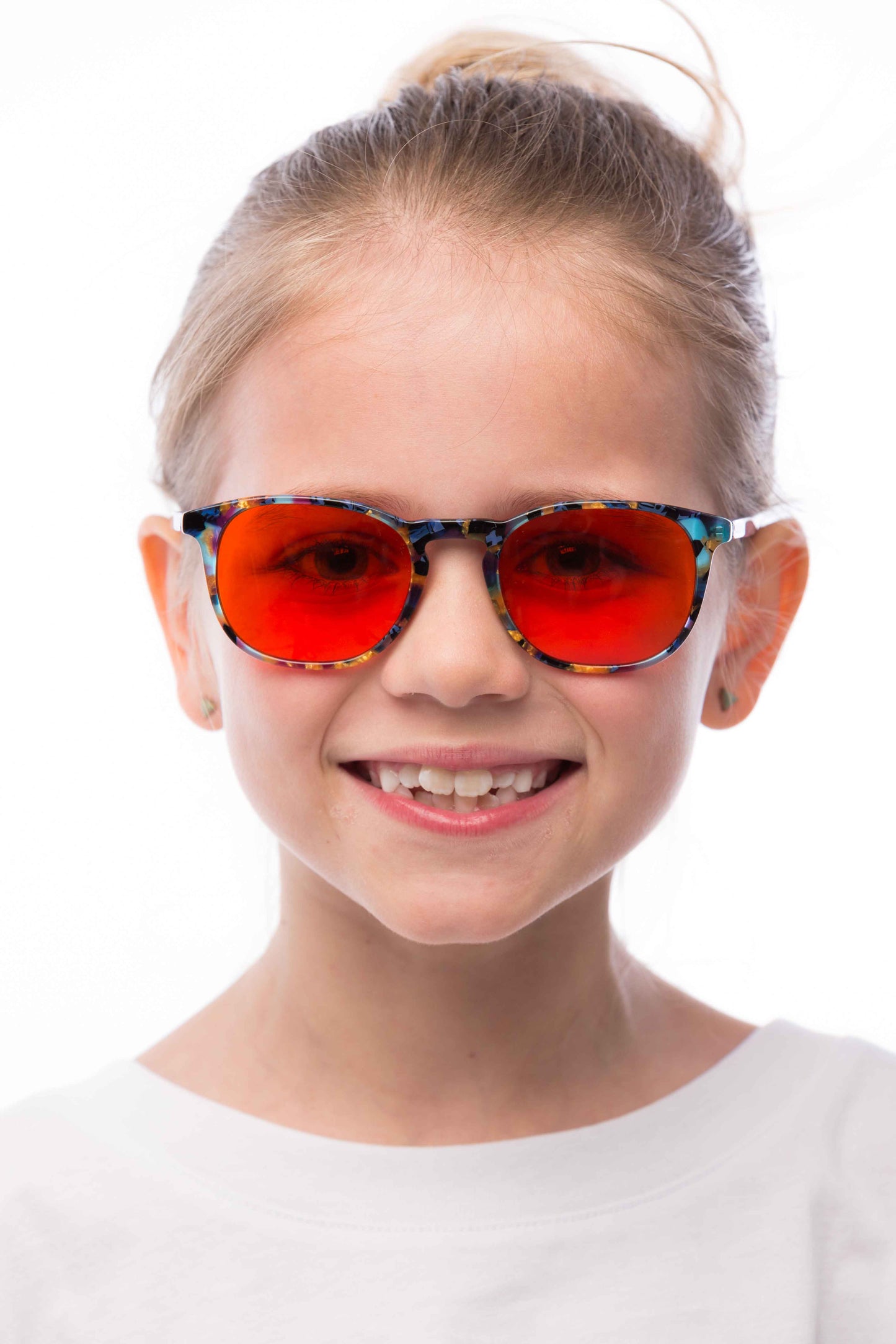 Girl Wearing Elsa Blue Light Blocking Glasses Readers, close up