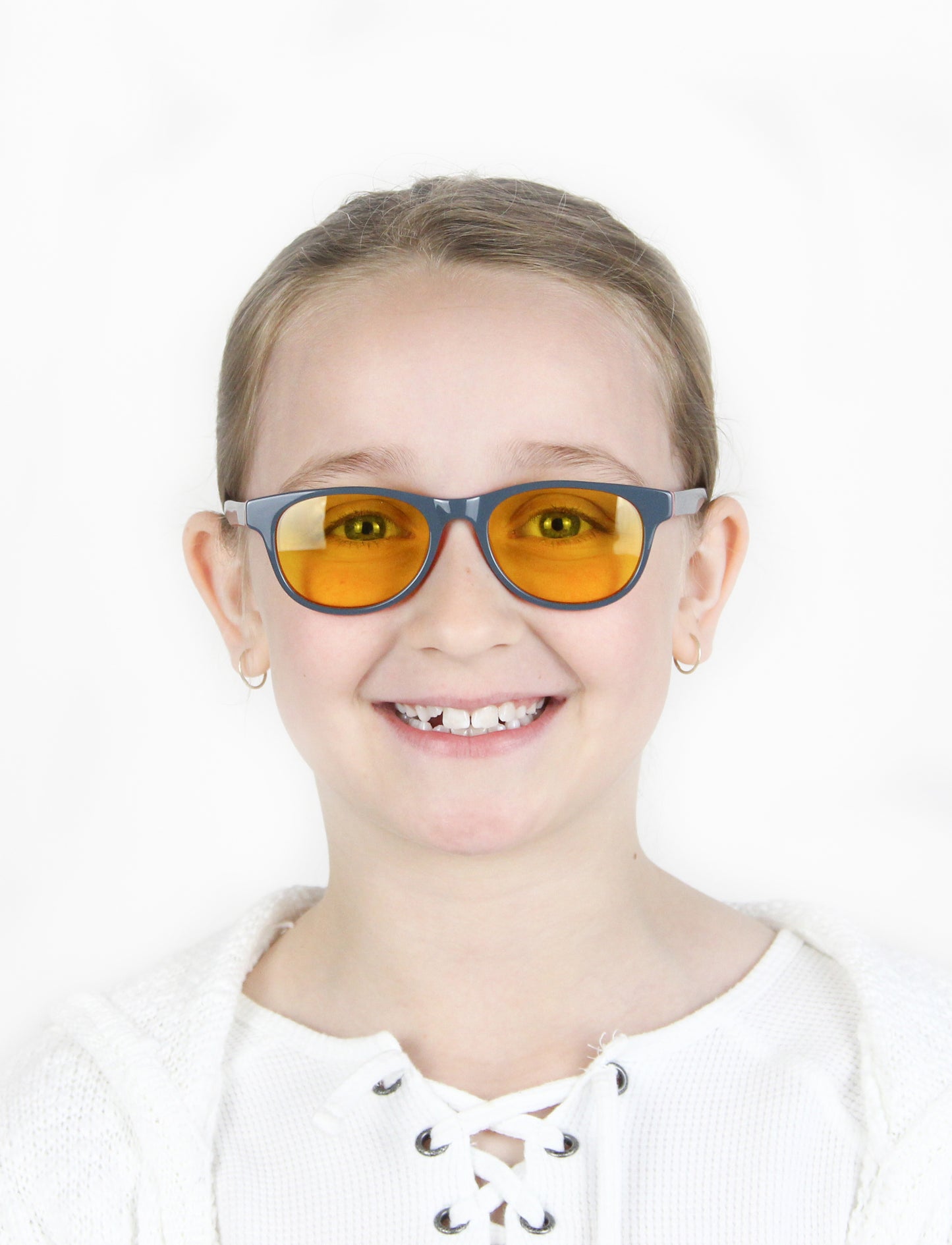 Girl Wearing Piper Light Sensitivity Glasses