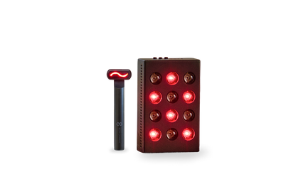 Mini red light device, glowing red, next to a red light face wand