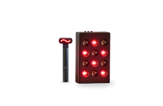 Mini red light device, glowing red, next to a red light face wand